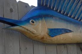 Neet wood carving of a sailfish sold as pictured. Sailfish 7 3 Long Chainsaw Carving Fish Carving