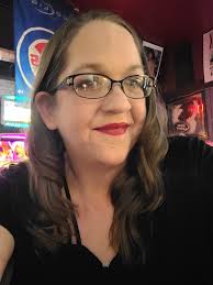 Can anyone edit the background of this so it doesn't look like a liquor  store 😅 something more professional please. And if the face needs fixing  at all just be kind 🙃 |