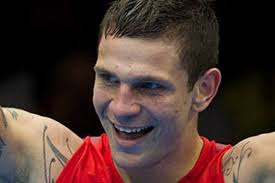 Olympic boxer charged with assaulting police