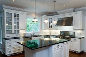 White also goes with a wide range of style options, including natural wood, stainless steel, painted surfaces, glass, copper, tile, marble. Raised Panel White Kitchen Cabinets With White Bead Board Backslash Raised Panel Kitchen Cabinets White Paneling Installing Kitchen Cabinets