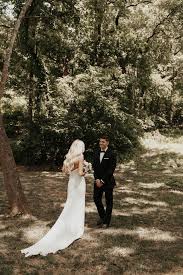 The bride and groom as well as the bridesmaids and best men at a wedding. This Spain Ranch Wedding Is The Dictionary Definition Of Soft And Simple Elegance Junebug Weddings