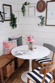 Small Breakfast Nook With Tulip Table And Bench Black White And Wood Tones With A Dash Of Pink For Dining Room Small Apartment Dining Room Apartment Dining
