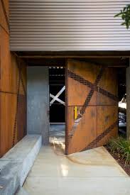 9 Pivoting Doors That Make A Real Statement Architecture Architecture Details Door Design