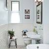 The exposed lightbulbs and copper piping show their industrial heritage, while the dark tile and wallpaper are definitely vintage. 3