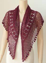 The poncho is constructed of sixteen floral motifs that are joined as work progresses. 29 Knots Of Love Shawl Crochet Pattern Crochet Designs Crochet Clothes