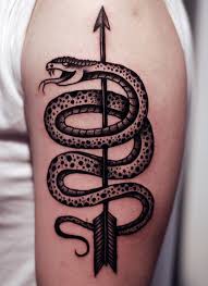 Scary snake tattoose on the leg : 9 Simple And Traditional Snake Tattoo Designs With Meanings Snake Tattoo Design Traditional Snake Tattoo Snake Tattoo
