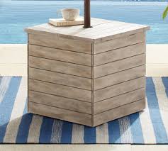 The market umbrella base is the most common base and is typically used for umbrellas that fit into a patio table. Indio Umbrella Stand Side Table Umbrella Stands Pottery Barn