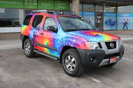 Full Tye Dye Wrap On A Nissan Xterra Designed And Installed By Eminent Custom Graphics Inc Inkyourride Com Nissan Xterra Car Paint Jobs Car Painting