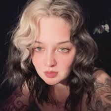 Can someone edit my photo to even out my face tone and add a flattering  background?