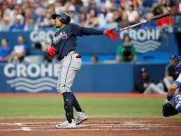 Hitting The Solo Grand Slam The Braves Johan Camargo Hits A Grand Slam Home Run Against The Blue Jays On June 19 In Toronto Ontario The Bra Atlanta Braves
