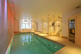Perfect for small basements, a lap pool has a swimming current that makes it a bit like a swimming treadmill. Basement Conversion With Lap Pool With Sauna At The Pool Side Modern Keller London Von London Basement Houzz
