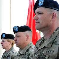 Spc. Nicholas Callahan (left), 44th Medical Brigade,