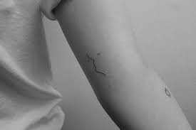 Minimalist Kiss Tattoo On The Left Inner Arm Tattoos Line Art Tattoos Minimalist Tattoo