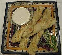 Edibles Delight Ultimate Garlic Breadsticks Twisted Recipes Round Table Garlic Twists Recipe Garlic Breadsticks