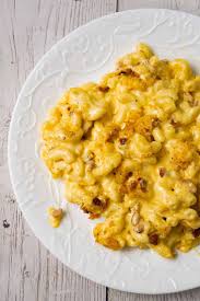 Macaroni is combined with canned cheese soup, topped with shredded colby cheese and baked. Mac And Cheese With Bacon This Is Not Diet Food