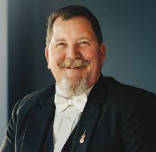 Education coordinator honored as guest conductor