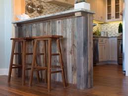 Rough sawed wood paneling gets an update by painting with whitewash paint recipe. How To Clad A Kitchen Island How Tos Diy