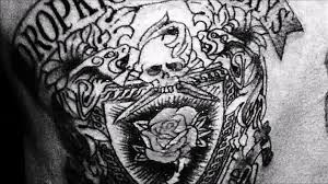 The rose tattoo referred to in this song appears on casey's arm and is a memorial to his grandfather who raised him after his father had. Dropkick Murphys Rose Tattoo