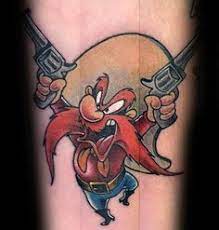 Upload a picture of a loved one, your favorite drawing, or a special design and create temporary tattoos you'll wish were permanent. 60 Looney Tunes Tattoos For Men Animated Cartoon Ink Ideas Tattoos For Guys Cartoon Character Tattoos Cartoon Tattoos