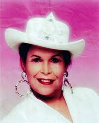 Circa 1994-1995 Photograph Glamour Shot of Transgender Activist Felicia  Flames Elizondo. Pictured: Color photograph of an unidentified transgender  woman. She wears a white jeweled cowboy hat, white blouse, large silver  hoop earrings,