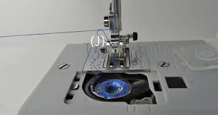 When the bobbin thread isn't getting picked up 99% of the time it has nothing to do with the bobbin. How To Re Thread A Sewing Machine In 4 Steps Craftsy