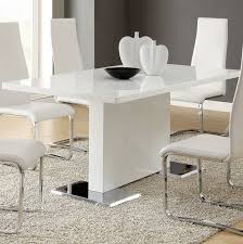 The wood used in the formal dining sets is crucial in establishing the theme of the room. Plumville Dining Table White Dining Chairs Contemporary Dining Room Sets White Dining Table