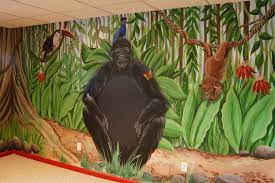 A Friendly Gorilla Toucan And Monkey In A Jungle Themed Playroom The Chest Of The Gorilla