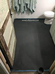Lighter shades of grey will be perfect for small bathrooms as they will not make them seem smaller. Hate Your Tile Floors Paint Them Lolly Jane