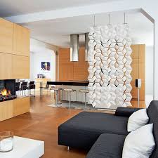 You can use area rugs, tall shelves, screen dividers and wall dividers. Hanging Room Divider Facet Bloomming