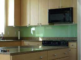 If there are no cabinets bordering the top of your glass, find creative ways to lock the glass in at the top, such as using the bracket for the vent hood (image 2). Back Painted Glass Backsplash Ikea Hackers