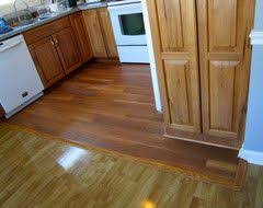 If you want your floor looks as a whole picture you must know how to install hardwood. Laminate Floors Get The Look Of Wood And More For Less Flooring Transition Flooring Hardwood Bedroom Floors