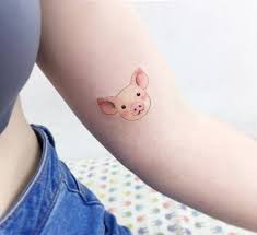 Although these are great spots, a pig tattoo can go anywhere. Pig Tattoo On The Left Inner Arm