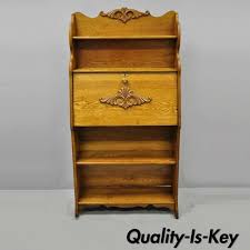 A chic traditional wooden secretary unit finished in browns and featuring a chevron design on front panels. Antique Victorian Golden Oak Wood Larkin Secretary Bookcase Slant Front Desk From Vintage Philly Furniture Of Philadelphia Attic