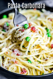 This Authentic Pasta Carbonara Recipe Is An Easy Spaghetti Carbonara Made With A Creamy Sauce Of Egg Carbonara Pasta Spaghetti Carbonara Pasta Carbonara Recipe