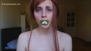 Sucking on baby pacifier - ThisVid.com