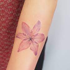 Black ink butterfly on lily flower tattoo design for thigh. Watercolor Lily By Tattooist G No Tattoogrid Net