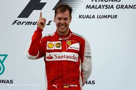 Ferrari's sebastian vettel celebrates his first grand prix win since 2013 and the 40th of his career. Sebastian Vettel Ferrari Sepang International Circuit 2015 Racefans