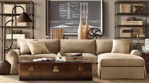 A white sofa matching the wall and floors sets the stage for cream vintage joe colombo chairs that flank a custom marmoreal coffee table. 16 Brilliant Living Room Designs With Masculine Touch