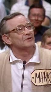 Bob Barker messes around with announcer Johnny Olson