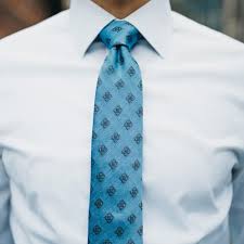 The head (wide part) to your right, the tail to your left. How To Tie A Tie Step By Step Guide Next Level Gents