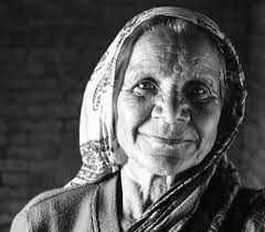 Black And White Old Woman Portrait Photography An Old Woman Smiles In Black And White
