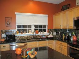 Burnt Orange Kitchen Black Granite Countertops Glass Tile Backsplash Orange Kitchen Decor Orange Kitchen Walls Orange Kitchen