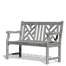 This bench is a bit more traditional and is available in gray, blue, and natural wood. Martha Weathered Gray Wood Geometric Back Garden Bench