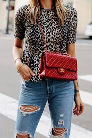 Fashion Jackson Wearing Ganni Leopard Peplum Top Levis Ripped Jeans Chanel Classic Flap Red Handbag Fashion Jackson Chanel Classic Flap Red Fashion