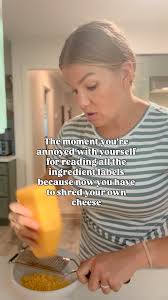 Crunchy Mom Woes What did I find out is in shredded cheese??? Pre-shredded  cheese contains anti-caking agents to keep the shreds from sticking  together. These can slightly alter taste, texture, and how