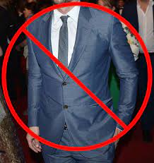 In the men's world, brown is often thought to dress down a navy suit. Before You Button That Bottom Button Consider This Qwear Queer Fashion Platform