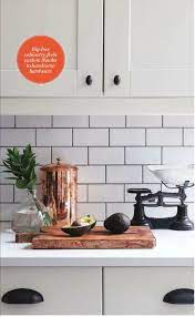 This bathroom from emma jane nation pairs shiny white wall tile with matte black floor tile, adding a modern twist to an otherwise very traditional bathroom. Elements Of Style Blog White Subway Tile Kitchen Canadian House Bathroom Remodel Designs
