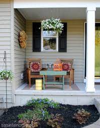 30 Rustic Spring Porch Decor Ideas To Help You Get Your Outdoor Space Ready For Spring Small Porch Decorating Front Porch Flowers Spring Porch