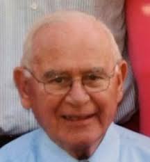 H. Giles Schmid, PhD.