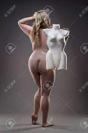 Young Beautiful Blonde Naked Plus Size Model With Dummy, Xxl Nude Woman On  Gray Studio Background, Full Length Portrait Stock Photo, Picture And  Royalty Free Image. Image 68551887.